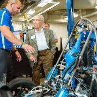 Seymour Padnos speaking with an engineering student.